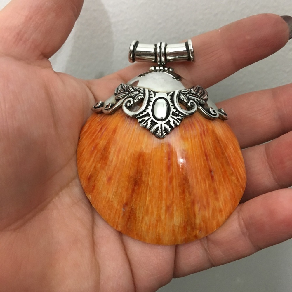 Large shell pendant.